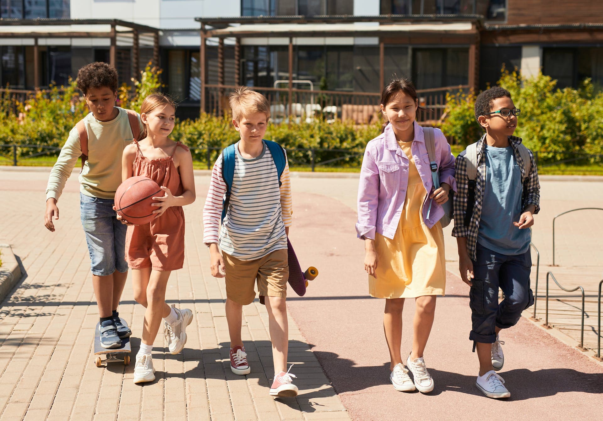 Group of diverse students walking together